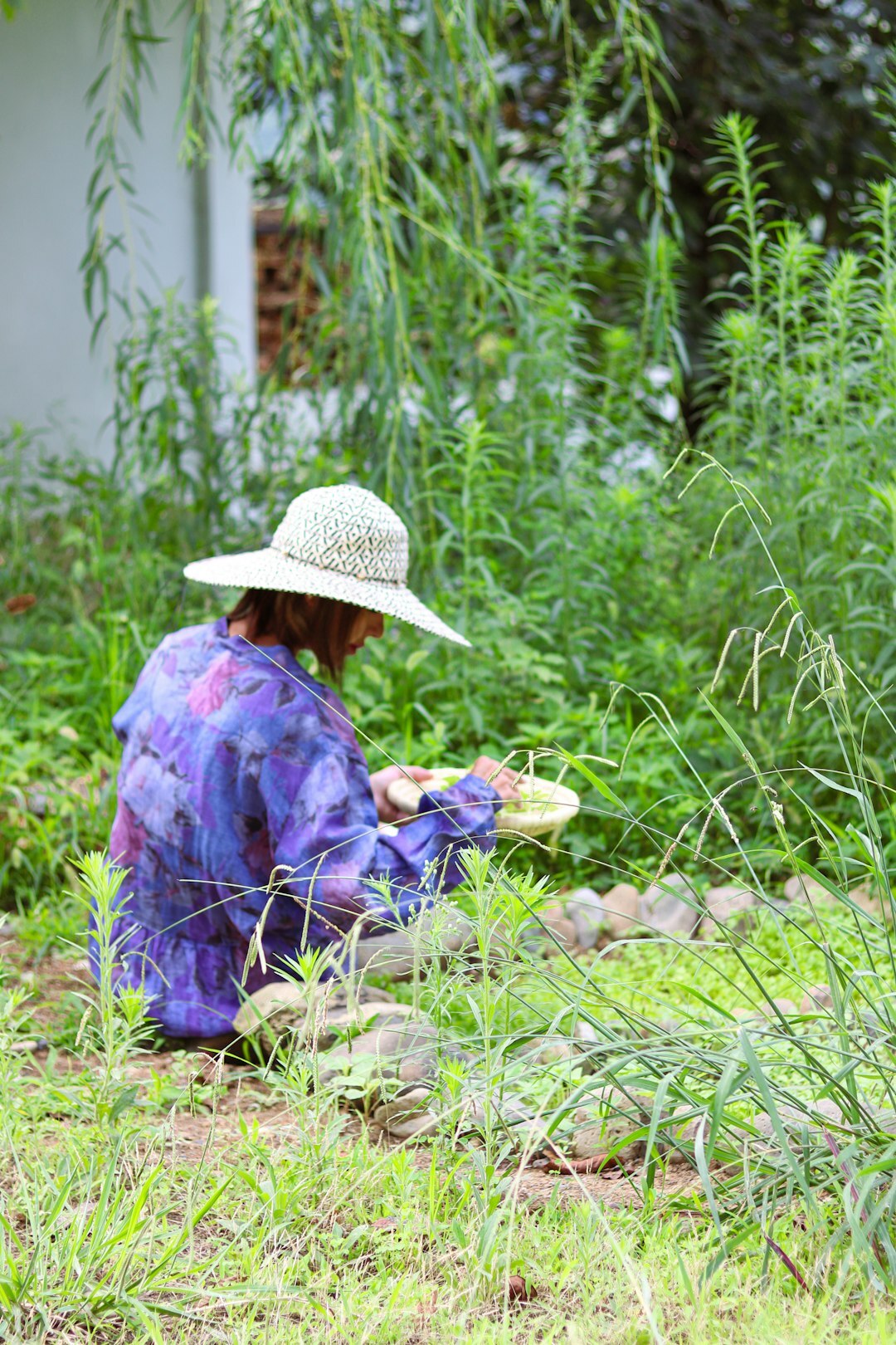 senior meditating in garden