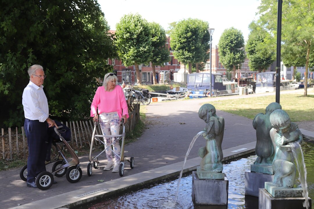 senior couple walking in park