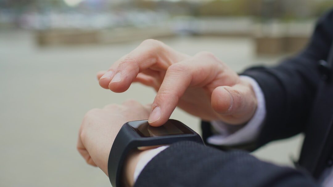 senior using smartwatch