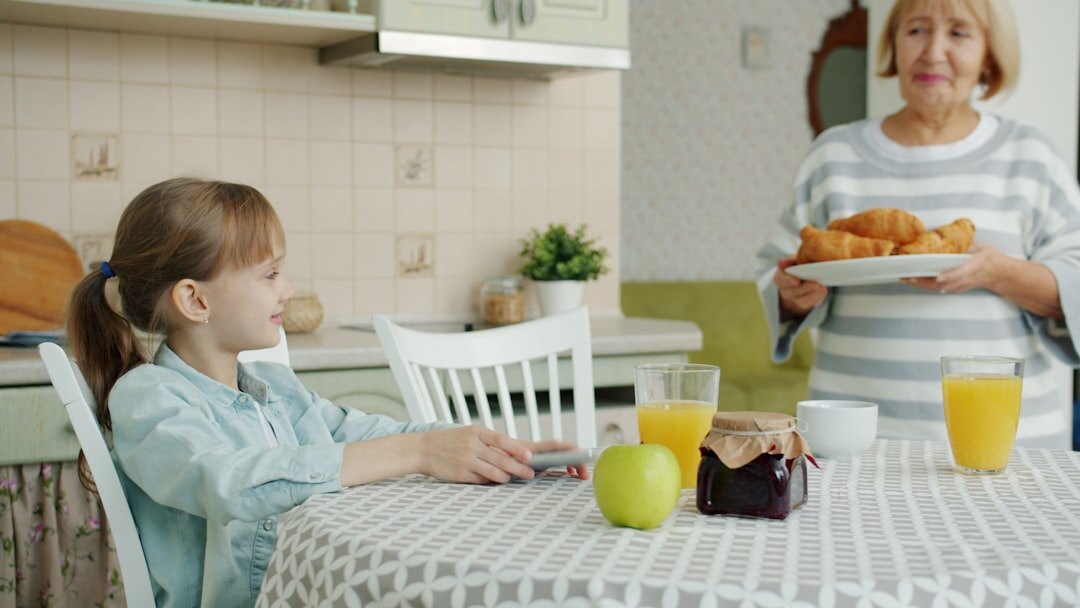 senior woman smiling at table