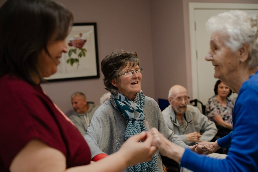elderly people enjoying group activity