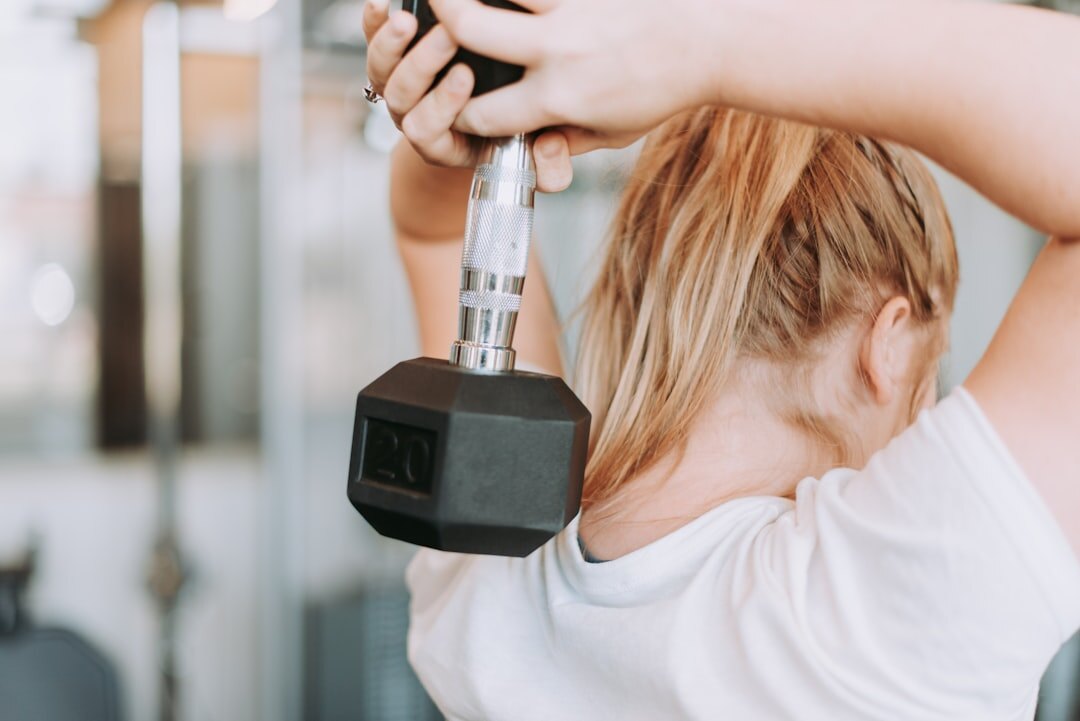 senior woman lifting weights