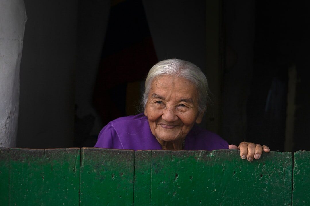Portrait of a smiling senior woman named Maria